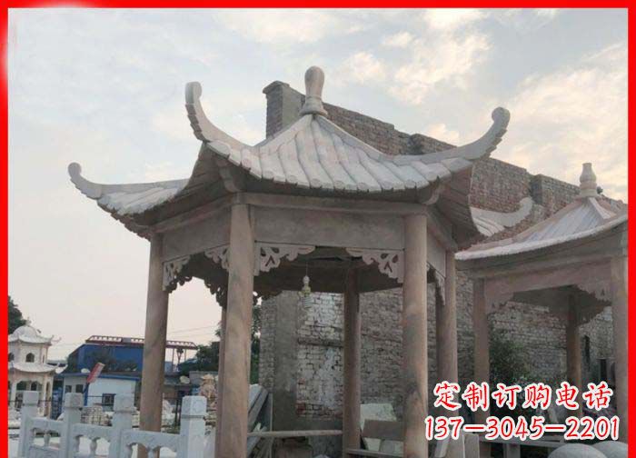 云南公园晚霞红六角石雕凉亭